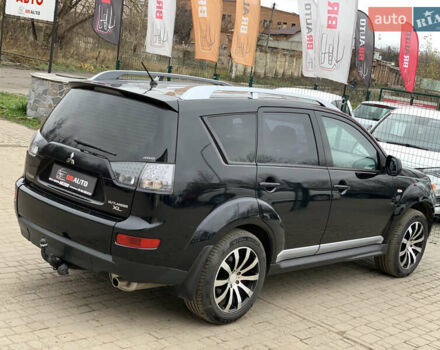 Черный Мицубиси Аутлендер ХЛ, объемом двигателя 2.4 л и пробегом 175 тыс. км за 10499 $, фото 14 на Automoto.ua