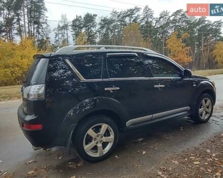 Черный Мицубиси Аутлендер ХЛ, объемом двигателя 3 л и пробегом 240 тыс. км за 9400 $, фото 3 на Automoto.ua