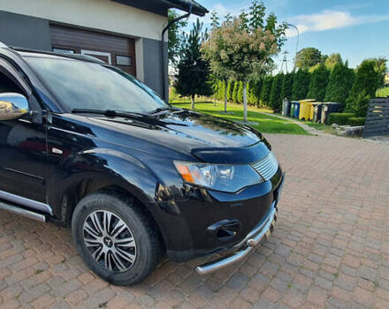 Черный Мицубиси Аутлендер ХЛ, объемом двигателя 2.4 л и пробегом 146 тыс. км за 10500 $, фото 3 на Automoto.ua