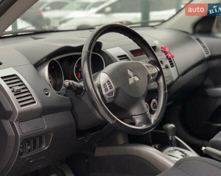 Черный Мицубиси Аутлендер ХЛ, объемом двигателя 2.4 л и пробегом 175 тыс. км за 10499 $, фото 23 на Automoto.ua