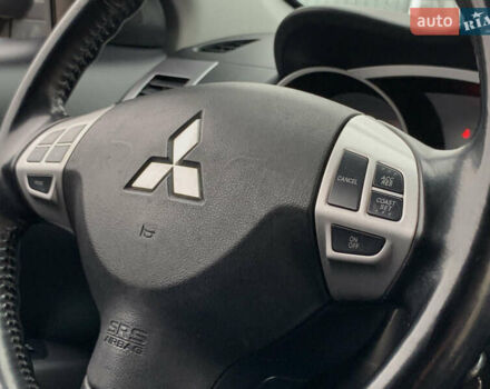 Черный Мицубиси Аутлендер ХЛ, объемом двигателя 2.4 л и пробегом 175 тыс. км за 10499 $, фото 39 на Automoto.ua