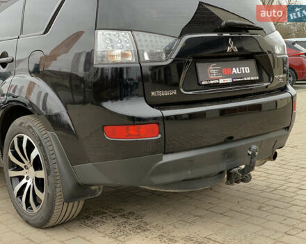 Черный Мицубиси Аутлендер ХЛ, объемом двигателя 2.4 л и пробегом 175 тыс. км за 10499 $, фото 19 на Automoto.ua