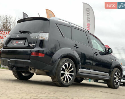 Черный Мицубиси Аутлендер ХЛ, объемом двигателя 2.4 л и пробегом 175 тыс. км за 10499 $, фото 13 на Automoto.ua