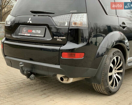 Черный Мицубиси Аутлендер ХЛ, объемом двигателя 2.4 л и пробегом 175 тыс. км за 10499 $, фото 20 на Automoto.ua