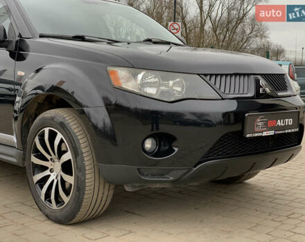 Черный Мицубиси Аутлендер ХЛ, объемом двигателя 2.4 л и пробегом 175 тыс. км за 10499 $, фото 7 на Automoto.ua