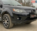 Черный Мицубиси Аутлендер ХЛ, объемом двигателя 2.4 л и пробегом 175 тыс. км за 10499 $, фото 7 на Automoto.ua