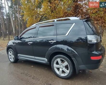 Черный Мицубиси Аутлендер ХЛ, объемом двигателя 3 л и пробегом 240 тыс. км за 9400 $, фото 4 на Automoto.ua