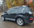 Черный Мицубиси Аутлендер ХЛ, объемом двигателя 3 л и пробегом 240 тыс. км за 9400 $, фото 4 на Automoto.ua