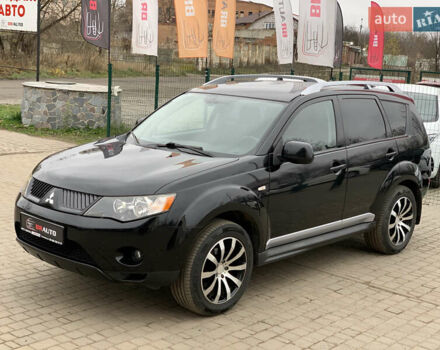 Черный Мицубиси Аутлендер ХЛ, объемом двигателя 2.4 л и пробегом 175 тыс. км за 10499 $, фото 2 на Automoto.ua