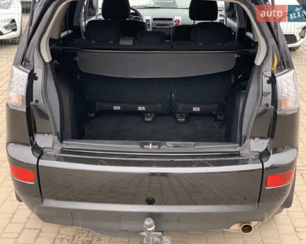 Черный Мицубиси Аутлендер ХЛ, объемом двигателя 2.4 л и пробегом 175 тыс. км за 10499 $, фото 27 на Automoto.ua