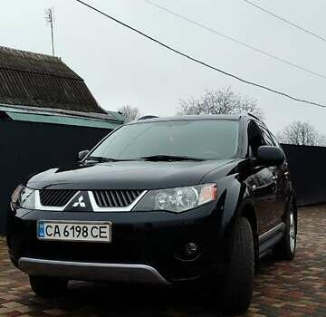 Чорний Міцубісі Аутлендер ХЛ, об'ємом двигуна 2.36 л та пробігом 150 тис. км за 11100 $, фото 3 на Automoto.ua