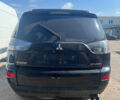 Черный Мицубиси Аутлендер ХЛ, объемом двигателя 2 л и пробегом 200 тыс. км за 2450 $, фото 1 на Automoto.ua
