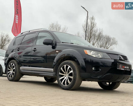 Черный Мицубиси Аутлендер ХЛ, объемом двигателя 2.4 л и пробегом 175 тыс. км за 10499 $, фото 5 на Automoto.ua
