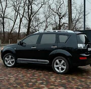 Чорний Міцубісі Аутлендер ХЛ, об'ємом двигуна 2.36 л та пробігом 150 тис. км за 11100 $, фото 4 на Automoto.ua