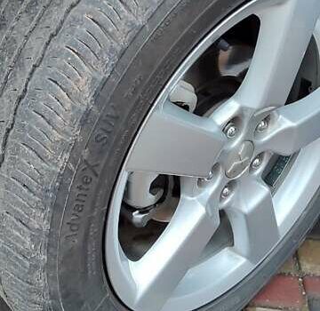 Чорний Міцубісі Аутлендер ХЛ, об'ємом двигуна 2.36 л та пробігом 150 тис. км за 11100 $, фото 10 на Automoto.ua