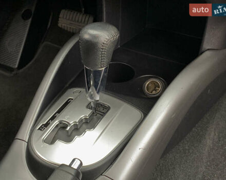 Черный Мицубиси Аутлендер ХЛ, объемом двигателя 2.4 л и пробегом 175 тыс. км за 10499 $, фото 36 на Automoto.ua