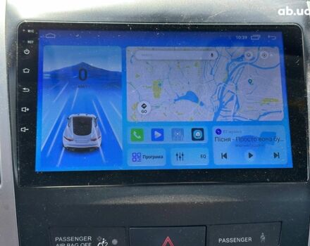 Чорний Міцубісі Аутлендер ХЛ, об'ємом двигуна 2 л та пробігом 265 тис. км за 11690 $, фото 25 на Automoto.ua