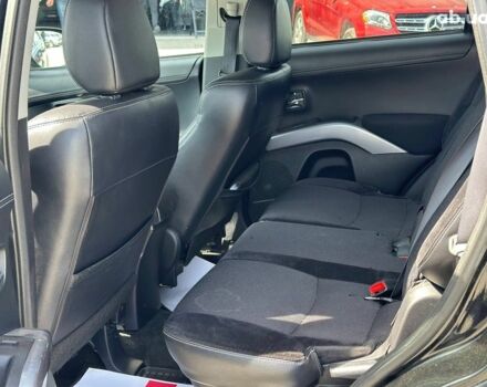 Чорний Міцубісі Аутлендер ХЛ, об'ємом двигуна 2 л та пробігом 265 тис. км за 11690 $, фото 26 на Automoto.ua