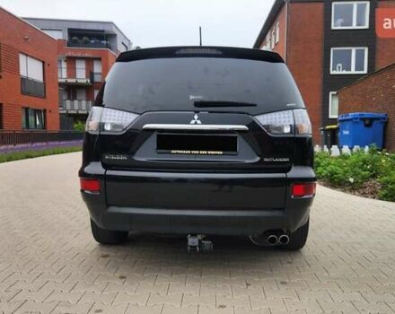 Мицубиси Аутлендер ХЛ 2010 в Днепре (Днепропетровске) на Automoto.ua Черный Мицубиси Аутлендер ХЛ, объемом двигателя 2.3 л и пробегом 193 тыс. км за 14999 $, фото 5 на Automoto.ua