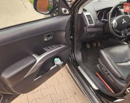 Мицубиси Аутлендер ХЛ 2010 в Днепре (Днепропетровске) на Automoto.ua Черный Мицубиси Аутлендер ХЛ, объемом двигателя 2.3 л и пробегом 193 тыс. км за 14999 $, фото 9 на Automoto.ua