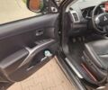 Мицубиси Аутлендер ХЛ 2010 в Днепре (Днепропетровске) на Automoto.ua Черный Мицубиси Аутлендер ХЛ, объемом двигателя 2.3 л и пробегом 193 тыс. км за 14999 $, фото 9 на Automoto.ua