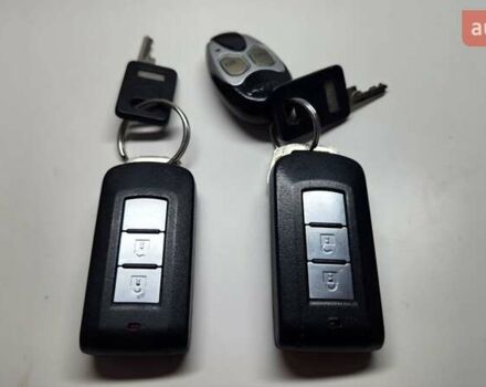 Мицубиси Аутлендер ХЛ 2010 в Днепре (Днепропетровске) на Automoto.ua Черный Мицубиси Аутлендер ХЛ, объемом двигателя 2.3 л и пробегом 193 тыс. км за 14999 $, фото 30 на Automoto.ua