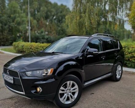 Черный Мицубиси Аутлендер ХЛ, объемом двигателя 2.2 л и пробегом 228 тыс. км за 10150 $, фото 1 на Automoto.ua