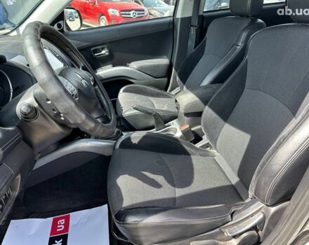 Чорний Міцубісі Аутлендер ХЛ, об'ємом двигуна 2 л та пробігом 265 тис. км за 11690 $, фото 16 на Automoto.ua