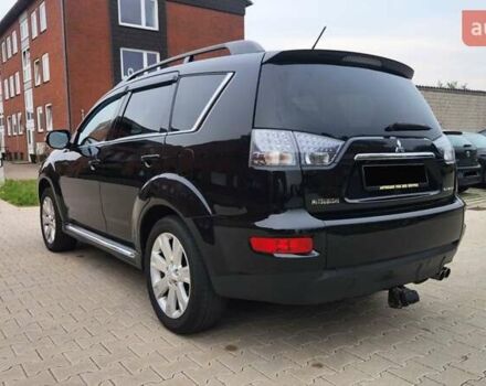 Мицубиси Аутлендер ХЛ 2010 в Днепре (Днепропетровске) на Automoto.ua Черный Мицубиси Аутлендер ХЛ, объемом двигателя 2.3 л и пробегом 193 тыс. км за 14999 $, фото 6 на Automoto.ua