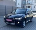 Черный Мицубиси Аутлендер ХЛ, объемом двигателя 2 л и пробегом 243 тыс. км за 9999 $, фото 1 на Automoto.ua