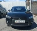 Черный Мицубиси Аутлендер ХЛ, объемом двигателя 2 л и пробегом 290 тыс. км за 12300 $, фото 1 на Automoto.ua