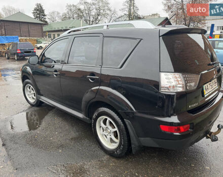 Черный Мицубиси Аутлендер ХЛ, объемом двигателя 2.36 л и пробегом 305 тыс. км за 10000 $, фото 2 на Automoto.ua