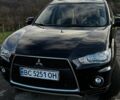 Черный Мицубиси Аутлендер ХЛ, объемом двигателя 2.2 л и пробегом 249 тыс. км за 11500 $, фото 1 на Automoto.ua