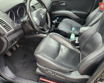 Мицубиси Аутлендер ХЛ 2010 в Днепре (Днепропетровске) на Automoto.ua Черный Мицубиси Аутлендер ХЛ, объемом двигателя 2.3 л и пробегом 193 тыс. км за 14999 $, фото 10 на Automoto.ua