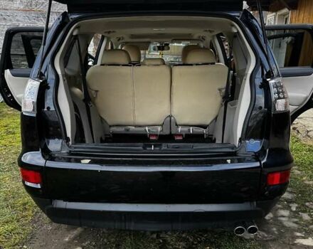 Черный Мицубиси Аутлендер ХЛ, объемом двигателя 2.2 л и пробегом 249 тыс. км за 11500 $, фото 4 на Automoto.ua