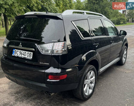 Черный Мицубиси Аутлендер ХЛ, объемом двигателя 1.97 л и пробегом 170 тыс. км за 9500 $, фото 3 на Automoto.ua