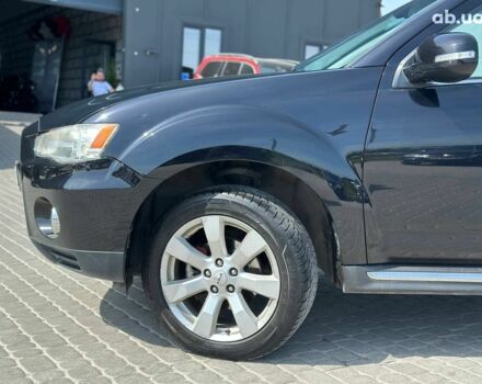 Чорний Міцубісі Аутлендер ХЛ, об'ємом двигуна 2 л та пробігом 265 тис. км за 11690 $, фото 2 на Automoto.ua