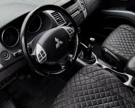 Черный Мицубиси Аутлендер ХЛ, объемом двигателя 2.2 л и пробегом 228 тыс. км за 10150 $, фото 8 на Automoto.ua