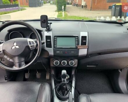 Мицубиси Аутлендер ХЛ 2010 в Днепре (Днепропетровске) на Automoto.ua Черный Мицубиси Аутлендер ХЛ, объемом двигателя 2.3 л и пробегом 193 тыс. км за 14999 $, фото 20 на Automoto.ua
