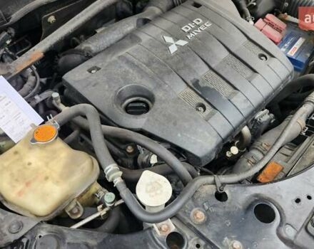 Мицубиси Аутлендер ХЛ 2010 в Днепре (Днепропетровске) на Automoto.ua Черный Мицубиси Аутлендер ХЛ, объемом двигателя 2.3 л и пробегом 193 тыс. км за 14999 $, фото 25 на Automoto.ua