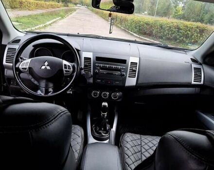 Черный Мицубиси Аутлендер ХЛ, объемом двигателя 2.2 л и пробегом 228 тыс. км за 10150 $, фото 12 на Automoto.ua