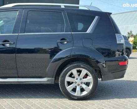 Чорний Міцубісі Аутлендер ХЛ, об'ємом двигуна 2 л та пробігом 265 тис. км за 11690 $, фото 4 на Automoto.ua