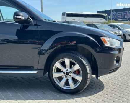 Чорний Міцубісі Аутлендер ХЛ, об'ємом двигуна 2 л та пробігом 265 тис. км за 11690 $, фото 10 на Automoto.ua
