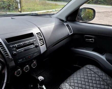 Черный Мицубиси Аутлендер ХЛ, объемом двигателя 2.2 л и пробегом 228 тыс. км за 10150 $, фото 11 на Automoto.ua