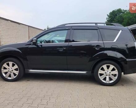 Мицубиси Аутлендер ХЛ 2010 в Днепре (Днепропетровске) на Automoto.ua Черный Мицубиси Аутлендер ХЛ, объемом двигателя 2.3 л и пробегом 193 тыс. км за 14999 $, фото 7 на Automoto.ua