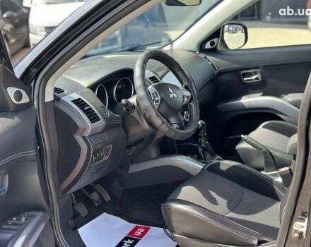 Чорний Міцубісі Аутлендер ХЛ, об'ємом двигуна 2 л та пробігом 265 тис. км за 11690 $, фото 15 на Automoto.ua