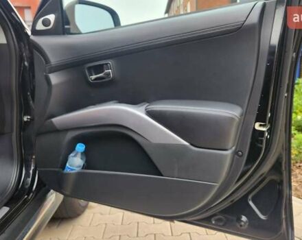 Мицубиси Аутлендер ХЛ 2010 в Днепре (Днепропетровске) на Automoto.ua Черный Мицубиси Аутлендер ХЛ, объемом двигателя 2.3 л и пробегом 193 тыс. км за 14999 $, фото 11 на Automoto.ua