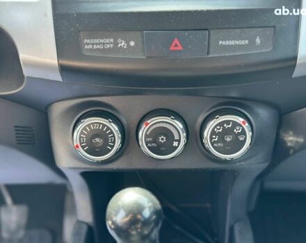 Чорний Міцубісі Аутлендер ХЛ, об'ємом двигуна 2 л та пробігом 265 тис. км за 11690 $, фото 19 на Automoto.ua