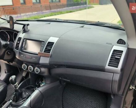 Мицубиси Аутлендер ХЛ 2010 в Днепре (Днепропетровске) на Automoto.ua Черный Мицубиси Аутлендер ХЛ, объемом двигателя 2.3 л и пробегом 193 тыс. км за 14999 $, фото 13 на Automoto.ua