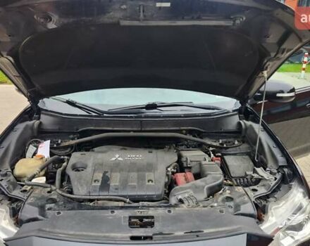 Мицубиси Аутлендер ХЛ 2010 в Днепре (Днепропетровске) на Automoto.ua Черный Мицубиси Аутлендер ХЛ, объемом двигателя 2.3 л и пробегом 193 тыс. км за 14999 $, фото 23 на Automoto.ua